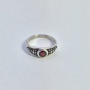 925 sterling ring with a red stone